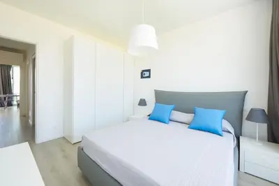 Letto o letti in una camera di Palms Apartments