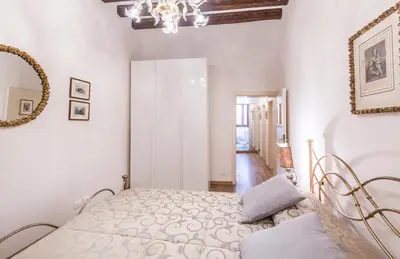 Letto o letti in una camera di CASA DEGLI ANGELI, free wi-fi near San Marco