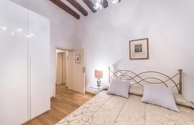 Letto o letti in una camera di CASA DEGLI ANGELI, free wi-fi near San Marco