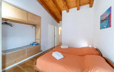 Letto o letti in una camera di Loggia Dal Lago