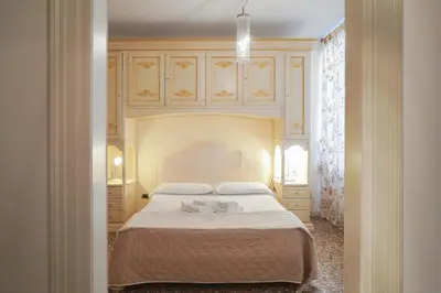 Letto o letti in una camera di Melusina Rialto Venice Center