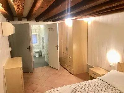 Letto o letti in una camera di Melusina Ca' Bernarda Venice Historical Center