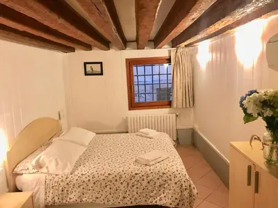 Letto o letti in una camera di Melusina Ca' Bernarda Venice Historical Center
