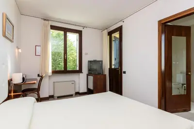 Letto o letti in una camera di Hotel San Marco