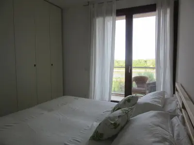 Letto o letti in una camera di Venezia nature&beach