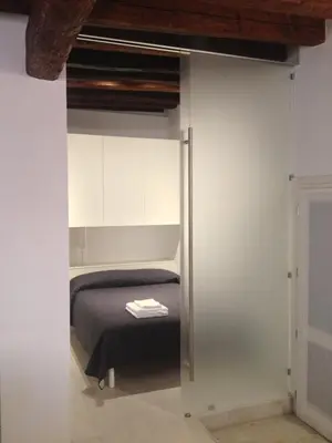 Letto o letti in una camera di Appartamento Carbona Sconta