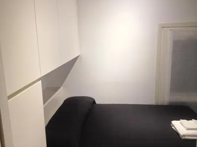 Letto o letti in una camera di Appartamento Carbona Sconta