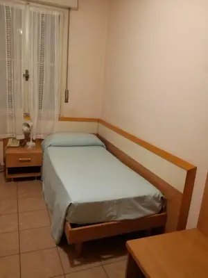 Letto o letti in una camera di Hotel Amba Alagi