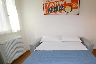 Letto o letti in una camera di WellVenice Cà D'Oro
