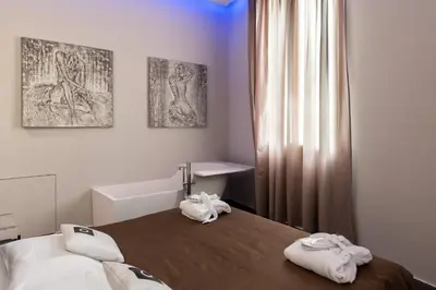 Letto o letti in una camera di Le Camp Suite & Spa