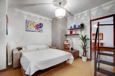 Letto o letti in una camera di Ca'Biennale 2