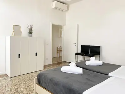 Letto o letti in una camera di Ca' Girolamo Apartment