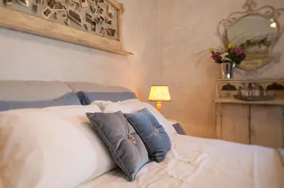 Letto o letti in una camera di Villa Irene