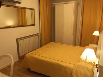 Letto o letti in una camera di Albergo ai Tolentini