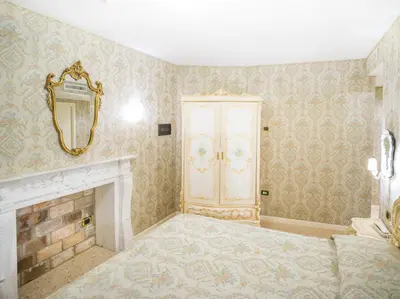 Letto o letti in una camera di Dimora Marciana