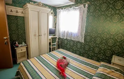 Letto o letti in una camera di Residenza La Campana