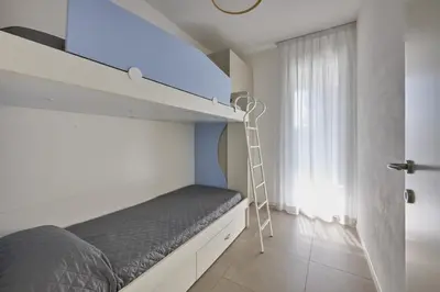 Letto o letti in una camera di Equilium Apartments