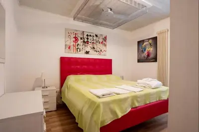 Letto o letti in una camera di VicenzaHoliday Frasche