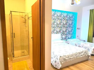 Letto o letti in una camera di The Caponi Bros