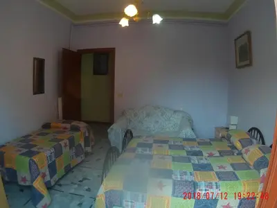 Letto o letti in una camera di The Caponi Bros