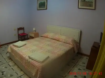 Letto o letti in una camera di The Caponi Bros
