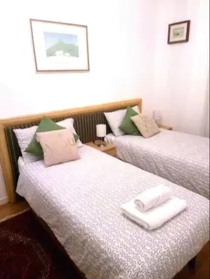 Letto o letti in una camera di Casa Isabella