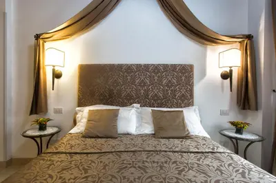 Letto o letti in una camera di Alla Vite Dorata
