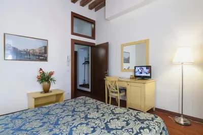 Letto o letti in una camera di Zaguri B&B