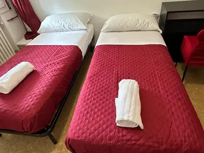 Letto o letti in una camera di Venice Concordia Guesthouse