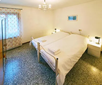 Letto o letti in una camera di CasaGiulietta