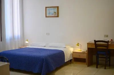 Letto o letti in una camera di Alloggi Barbaria