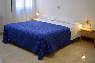 Letto o letti in una camera di Alloggi Barbaria