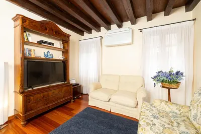 TV o dispositivi per l'intrattenimento presso San Marco Elegant Apartments a Step from St Marks Square - Venice Heaven Apartments Collection