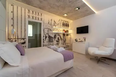 Letto o letti in una camera di Ca' de la Fonte - WENICE Deep Culture