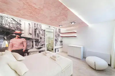 Letto o letti in una camera di Ca' de la Fonte - WENICE Deep Culture
