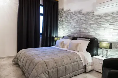 Letto o letti in una camera di Stella Marina 5