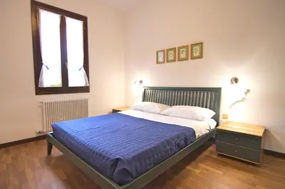 Letto o letti in una camera di Ca' Nova Apartments