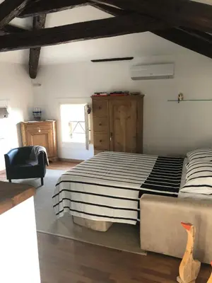 Letto o letti in una camera di Alla vigna