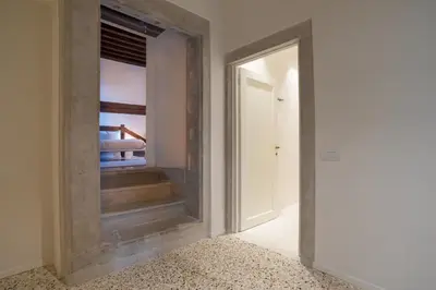 Letto o letti in una camera di Palazzo Vendramin Costa