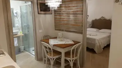 Letto o letti in una camera di La Bonbonnier