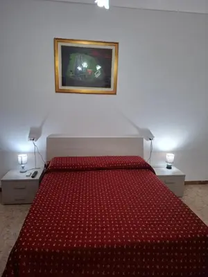 Letto o letti in una camera di LOCAZIONE TURISTICA Sansevero Venice
