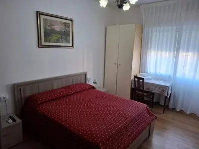 Letto o letti in una camera di LOCAZIONE TURISTICA Sansevero Venice