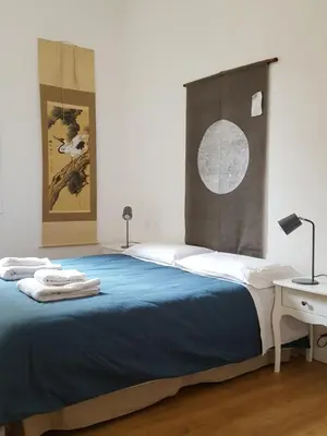 Letto o letti in una camera di Casa Barzizza