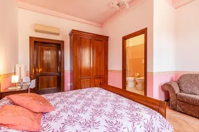 Letto o letti in una camera di Casa delle Rose Venice Lido