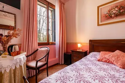 Letto o letti in una camera di Casa delle Rose Venice Lido