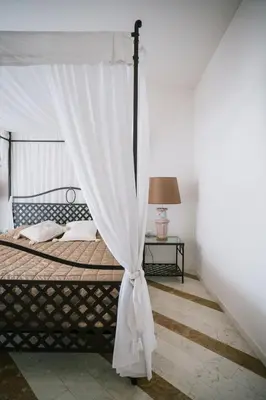 Letto o letti in una camera di Villa Carlotta Jesolo Lido