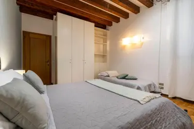 Letto o letti in una camera di San Marco - 2 bedrooms with lift