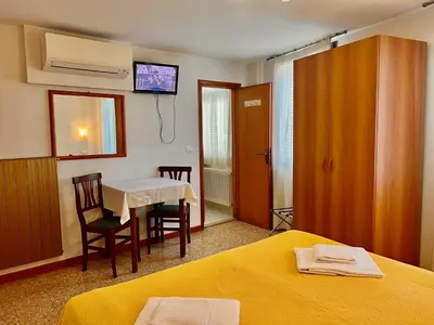 Letto o letti in una camera di Hotel Canada