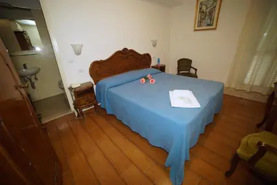 Letto o letti in una camera di Hotel Canada