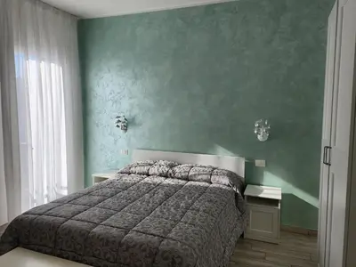Letto o letti in una camera di Casa Mara